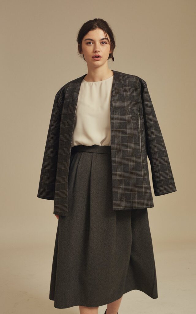 A natural-looking young woman wearing a simple outfit finished with pointed-toe shoes. Theme fashion inspo outfits